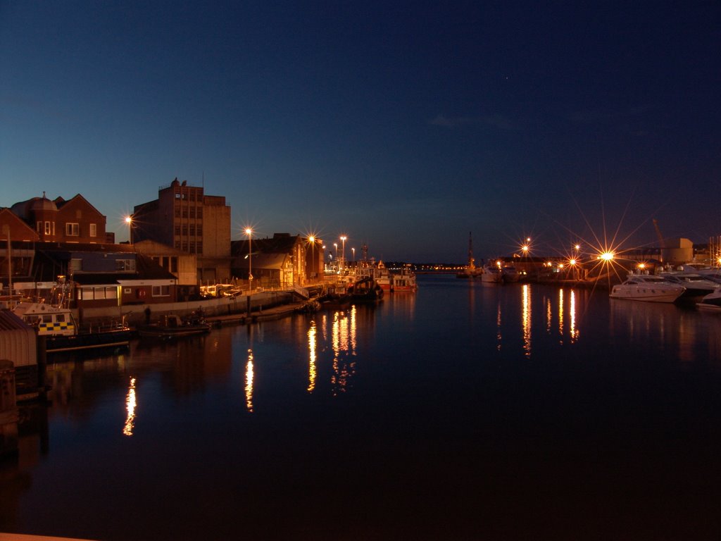 Poole harbour at night by franczak