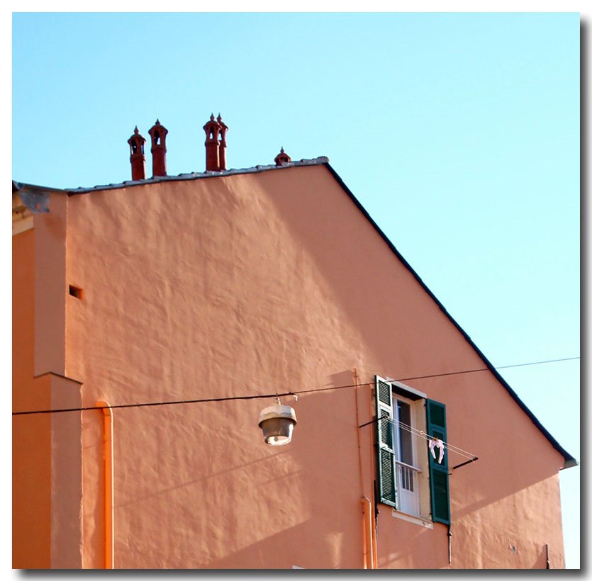 Imperia 15nov08 Only two chimneys and a window with two things out by esseil panoramio