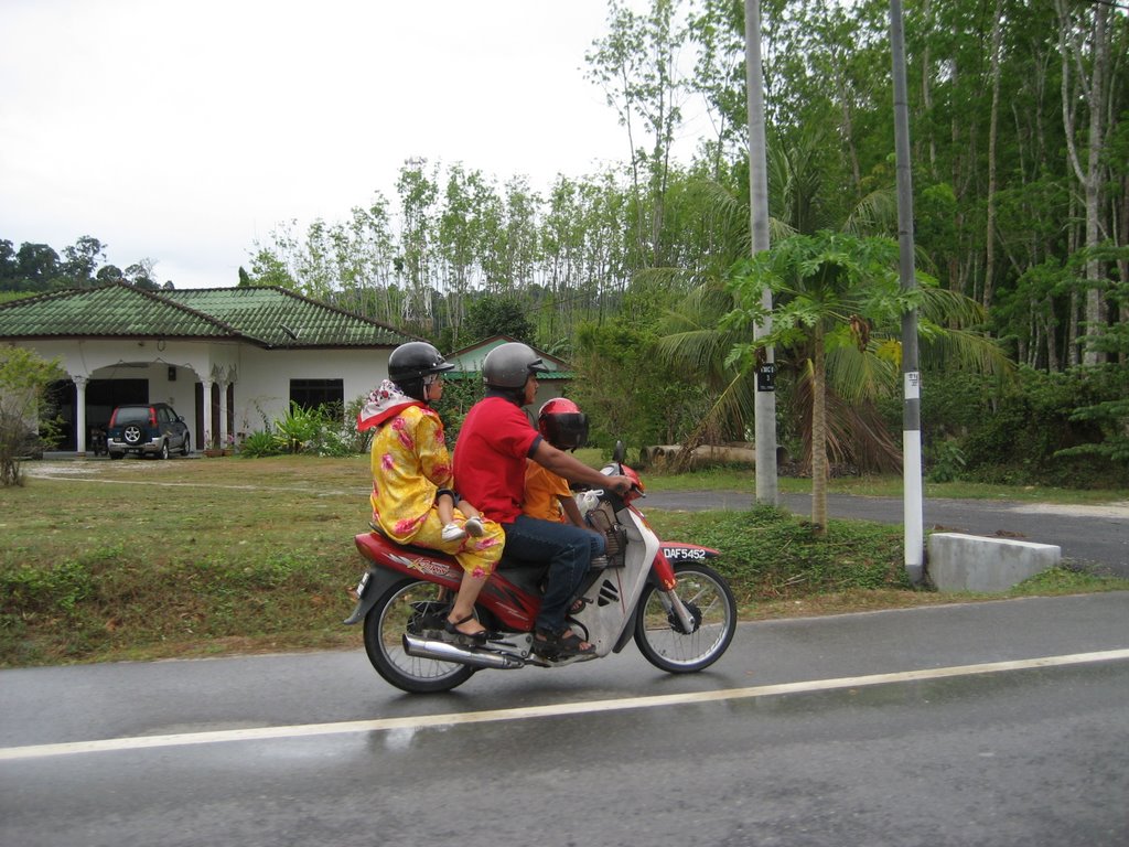 Langkawi family, Malaysia by Greg & Teri Weeger