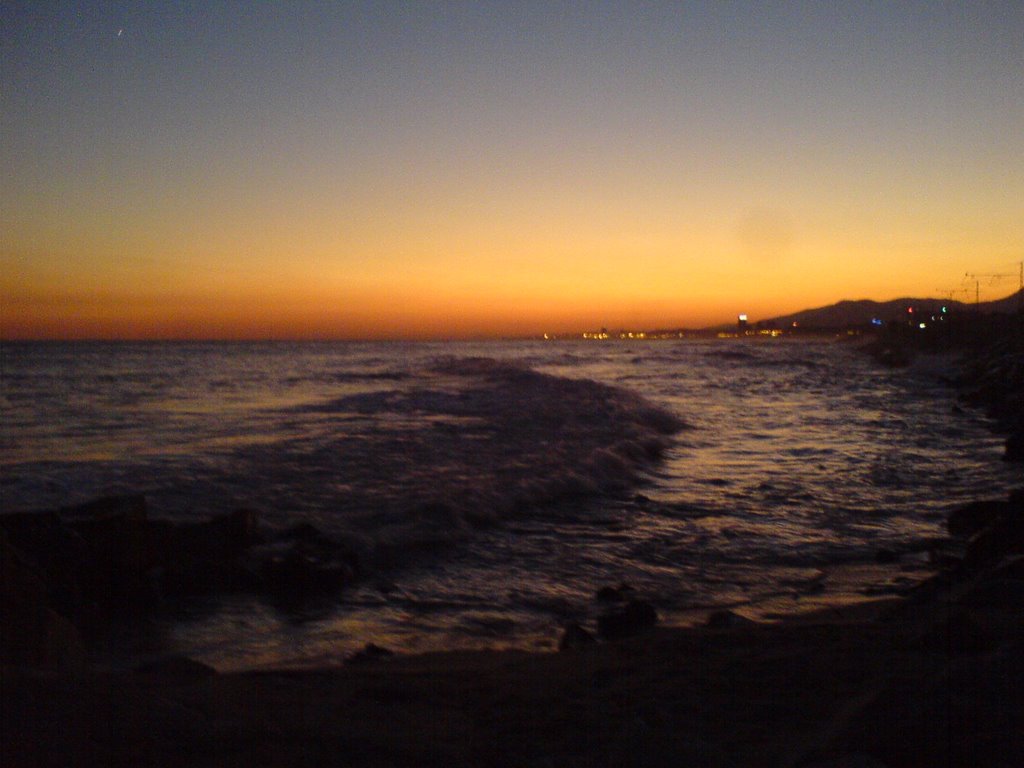 El mar i Mataró de fons, posta de sol by Stormer