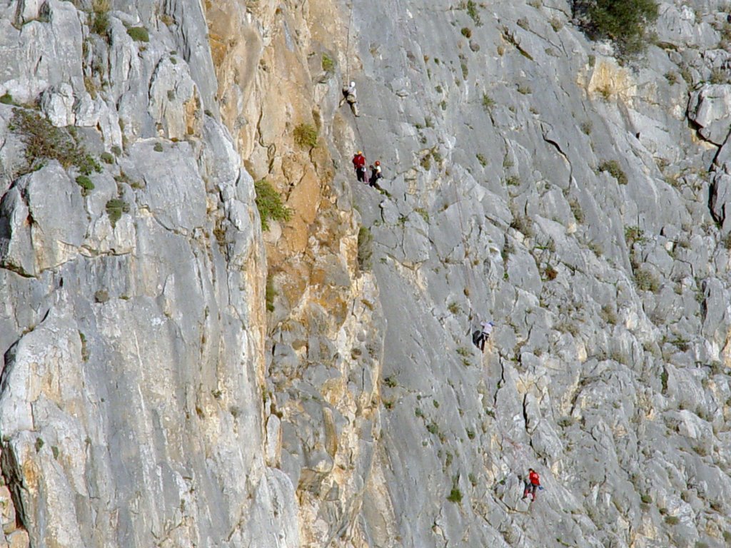 CLIMBING ON THE ROCKS, KRYONERI, GREECE by tetrakinitos