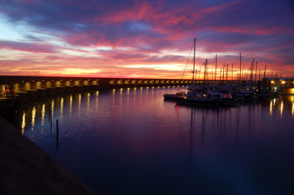 Brighton Marina sunset by Roger Sanderson