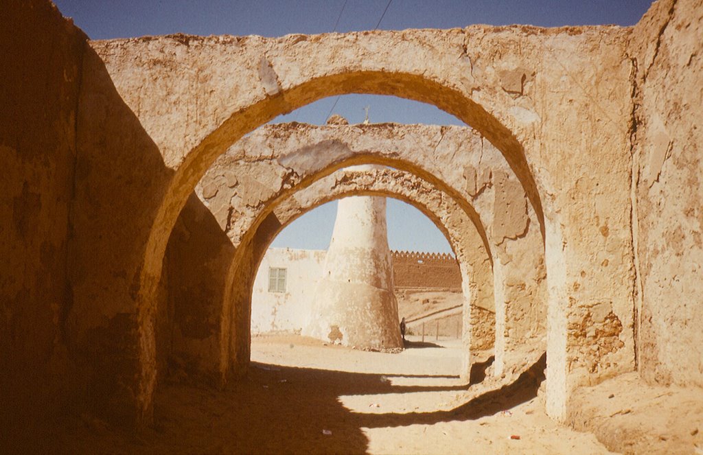 Ancient gate and prayer tower by P.Mrazek