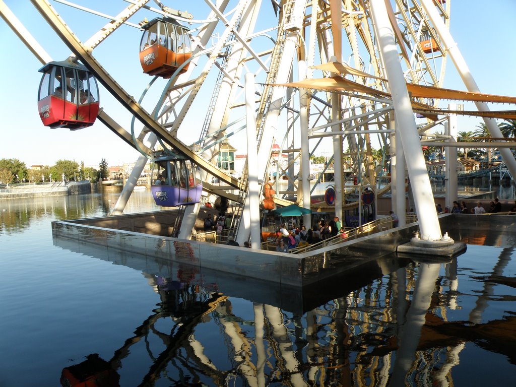 The Reflection Of SunWheel In DisneyLand, Anaheim, California, USA. by Nasir Uddin