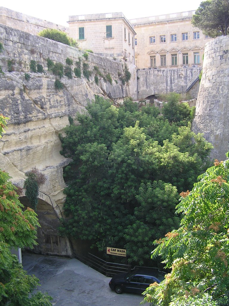 Valletta, Car Wash at town wall. by Ghjenk