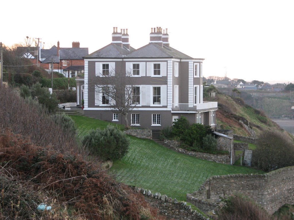 House on the cliff above Howth, Ireland by Albert Griffiths