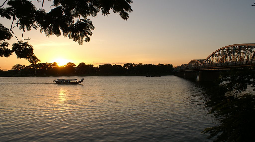 Hue, sunset on Perfume river, South-West side of Eiffel Bridge by alemezo