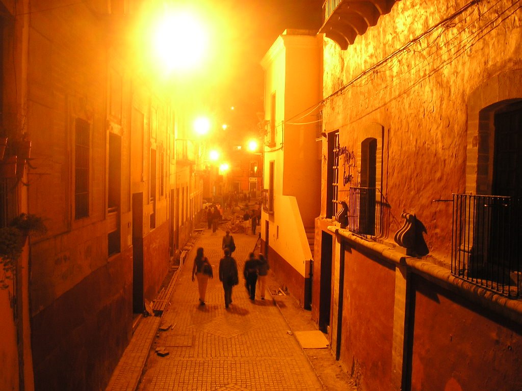 Callejon from the café at night by Karim Musalem