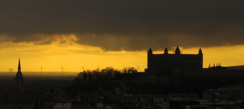 Bratislava castle at orange sunset (view from faculty of civil engineering) by Zdeněk Hubatka