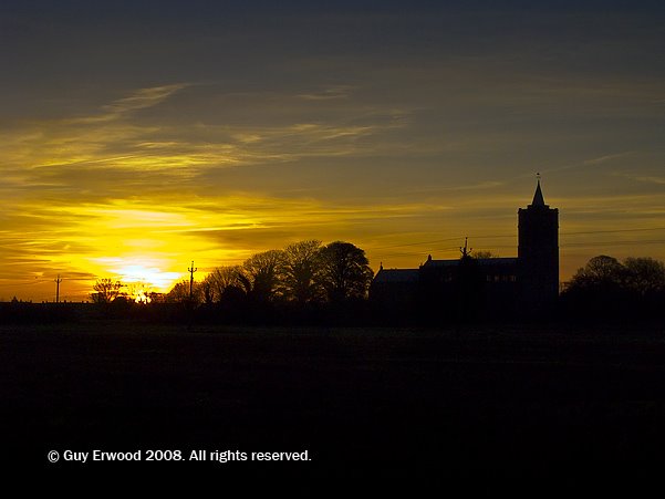 Gedney: Sunrise and the parish church by Guy Erwood