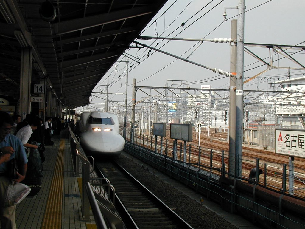 Bullet Train Arriving at Nagoya Train Station by Yun Zhu