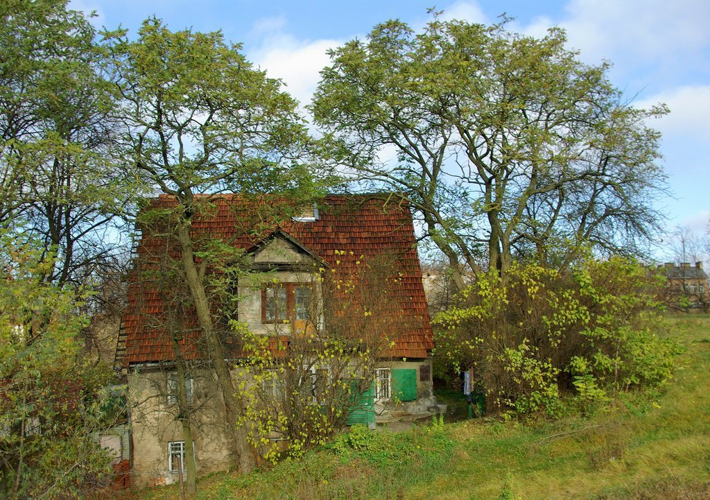 Small house near bus station by Antanas Kairys