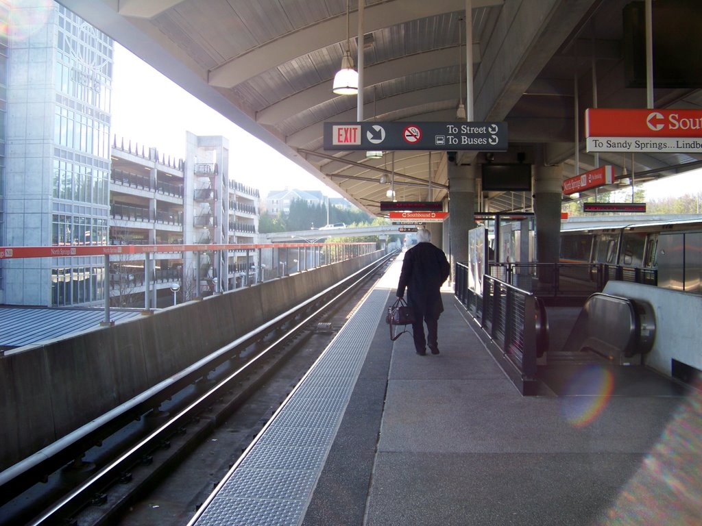 Waiting for the train in the cold... by GaCalDude