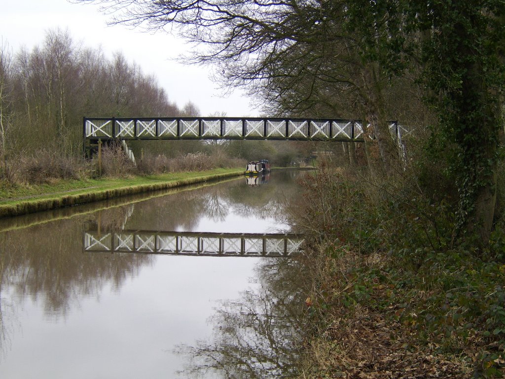 Footbridge and reflection by John Mulder