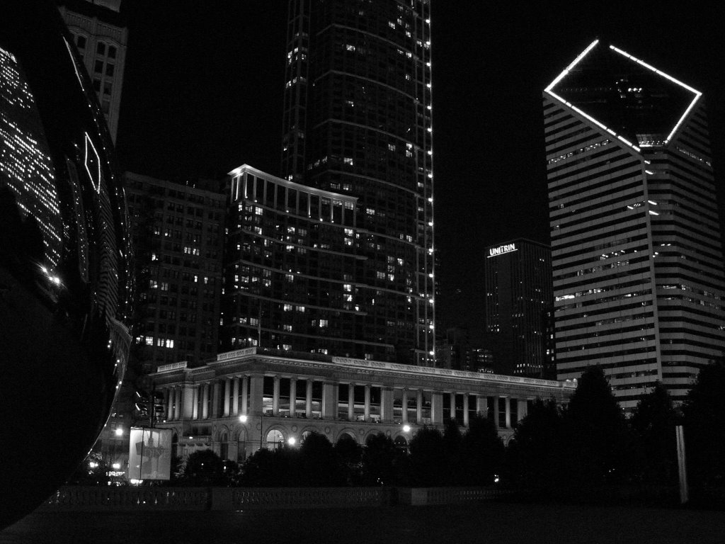 Equitable Building and Cultural Center reflected in Cloud Gate, Chicago by David Bearden