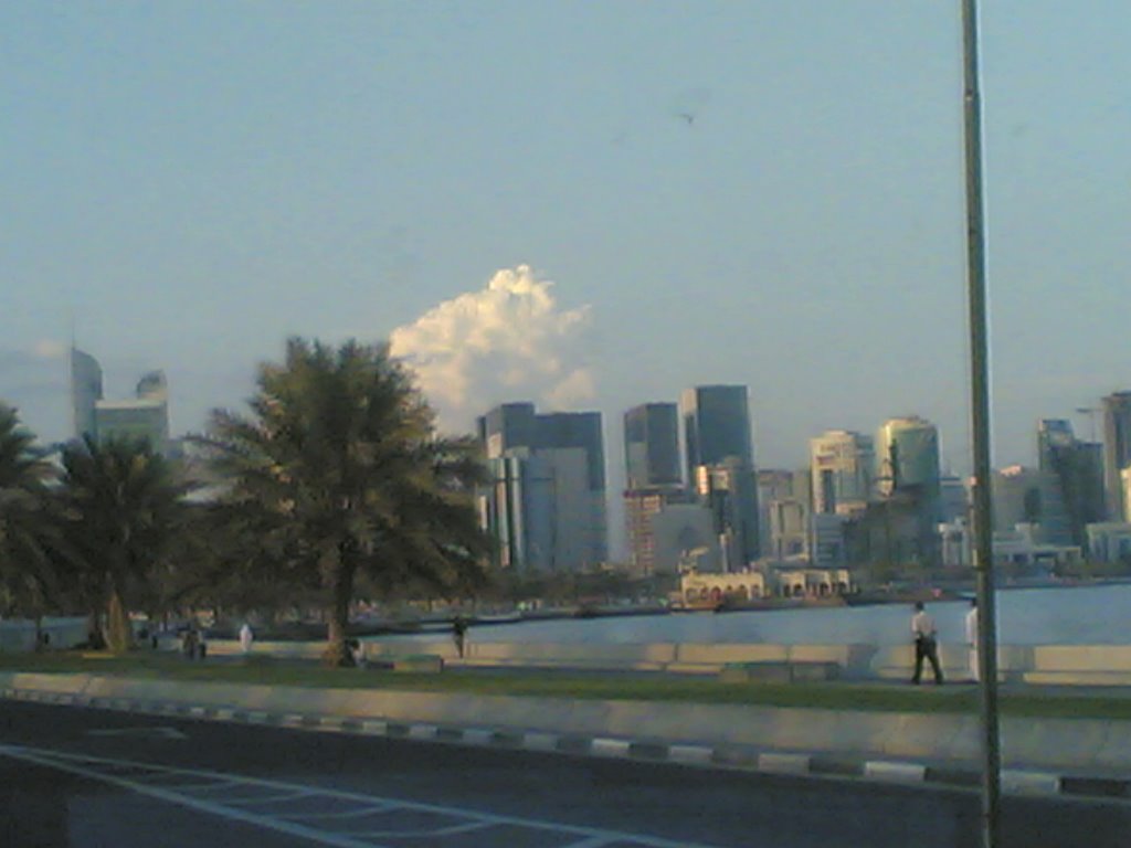 A big cloud behind doha towers by QEAF