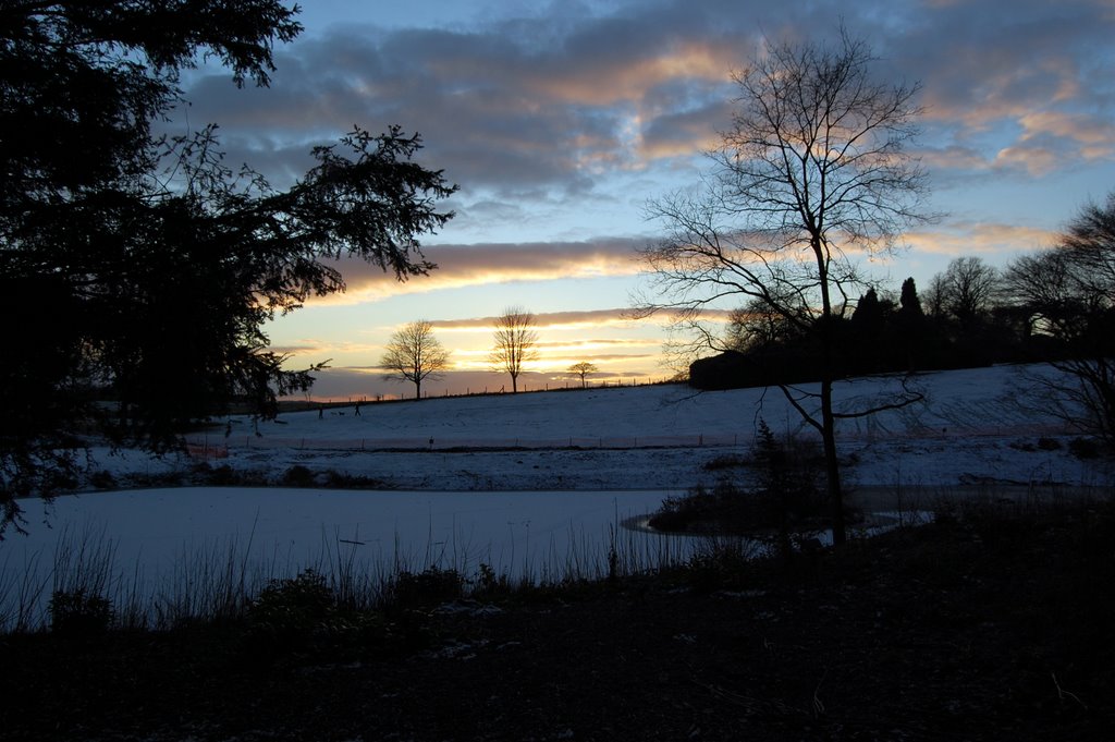 Keele: sunset over frozen lake. by Sarah Graham