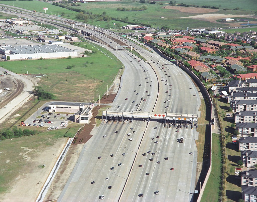 62 Looking east Bush Turnpike at the main toll plaza just west of Coit Road by Marek Stanek