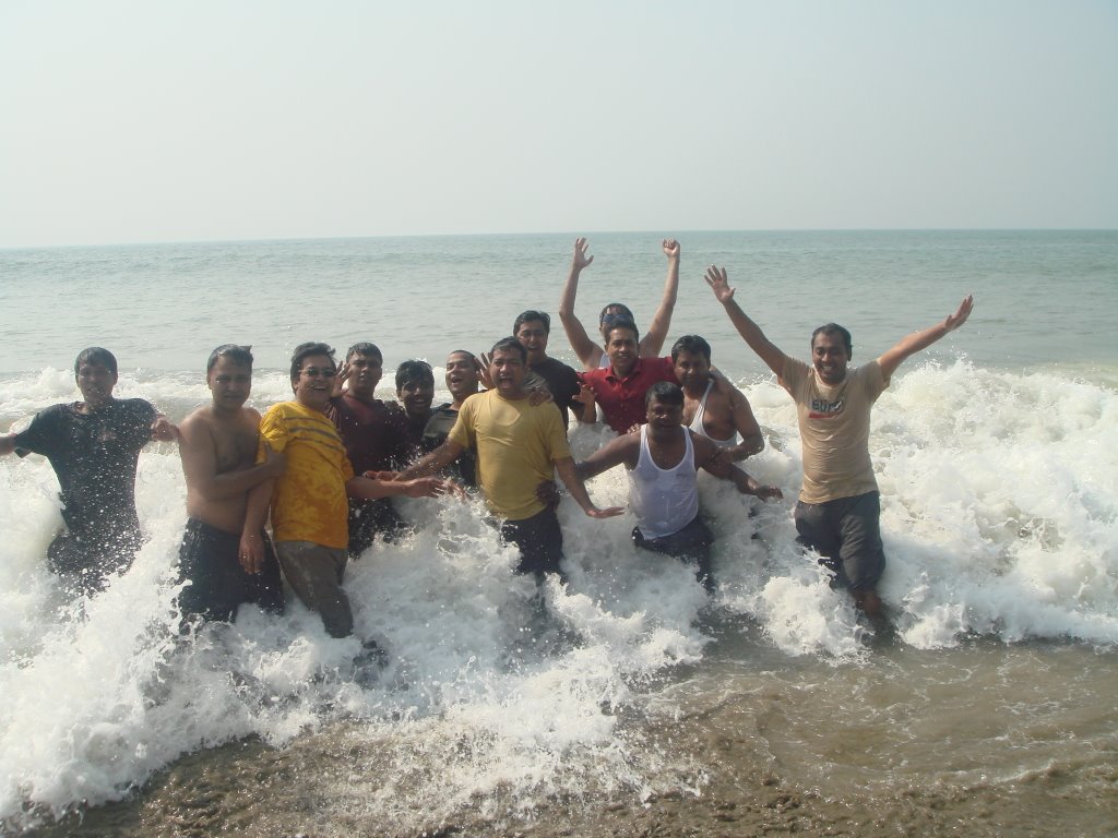 Masum & others in the wave at Cox's bazar beach by masum_uddin