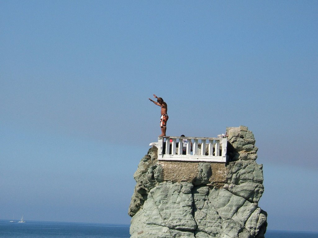 Cliff Diver Mazatlán by Tom Whitmore