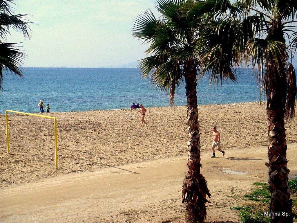 Winter swimmers by the sea by Marina Sp.