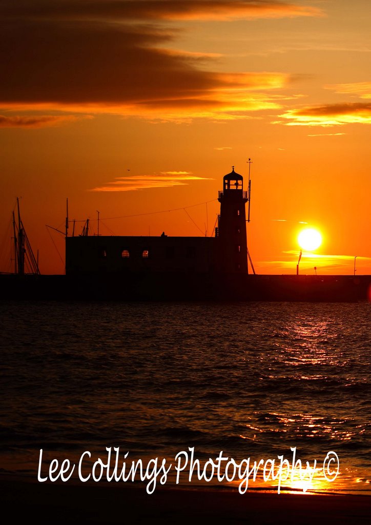 Scarborough Lighthouse at Sunrise by Lee Collings