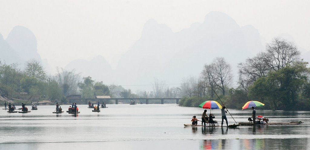 Bamboo Boats on Yulong River by Vojta Srejber