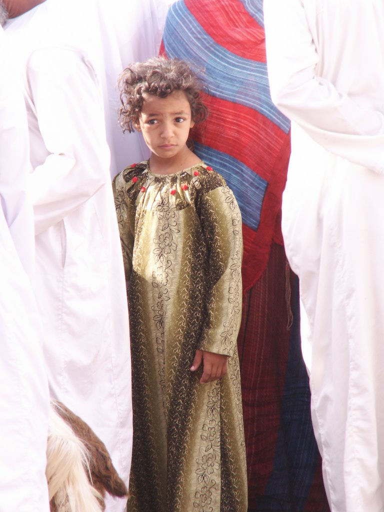 Girl at Nizwa market by bramscheutjens