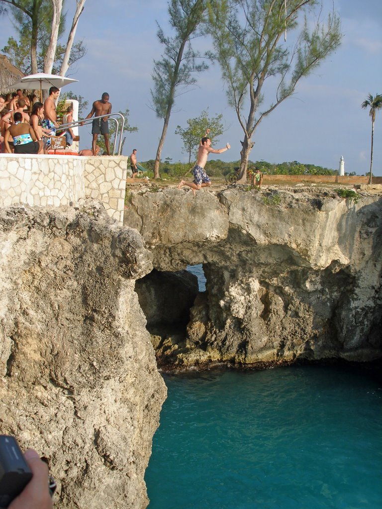 Cliff diving at Ricks Cafe by turbobndt