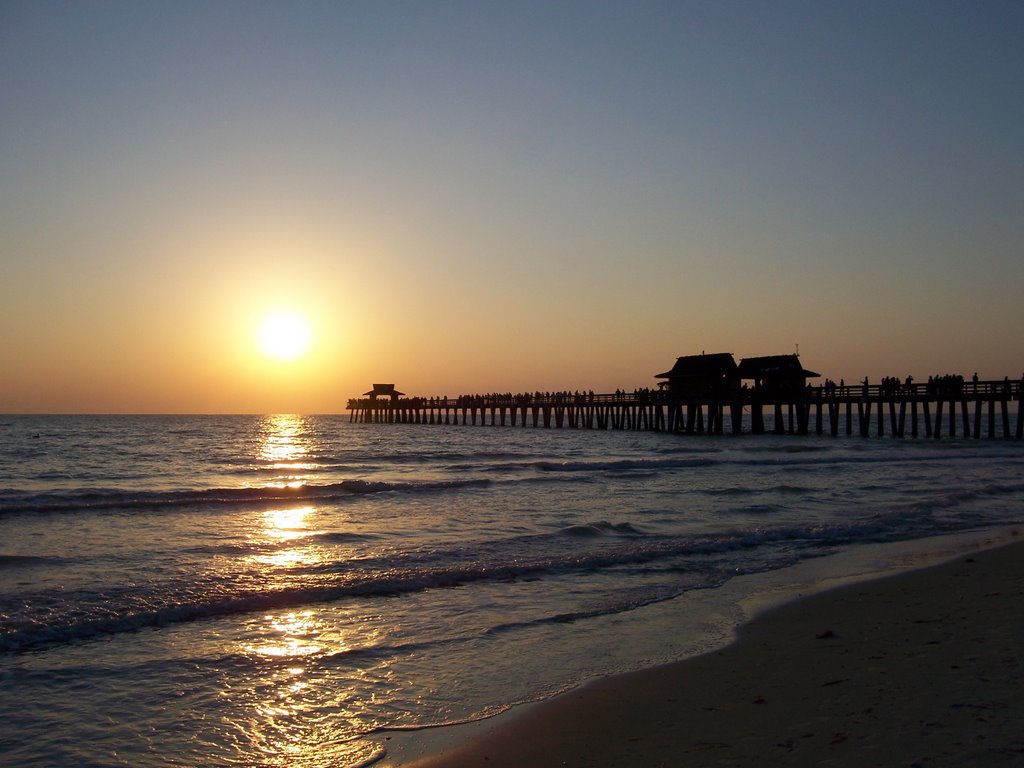 Sunset at Naples Pier, Naples, FL by Margaret Mouret