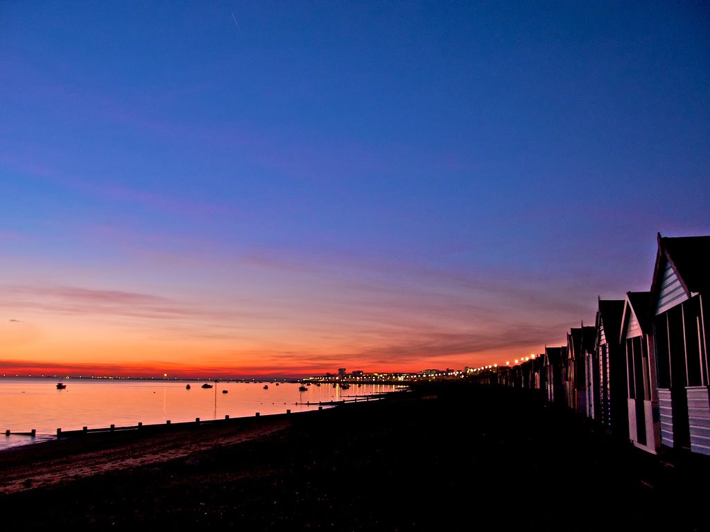 Beach Hut Sunset by paulmonkey