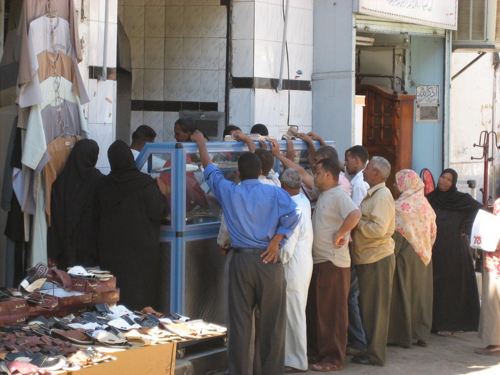 Aswan market, lunch time, 2007 by erik lau