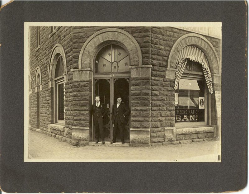 Elmer Griffin & G.H. Fink in front of the original Citizens Bank of Edmond location. by CitizensBankofEdmond