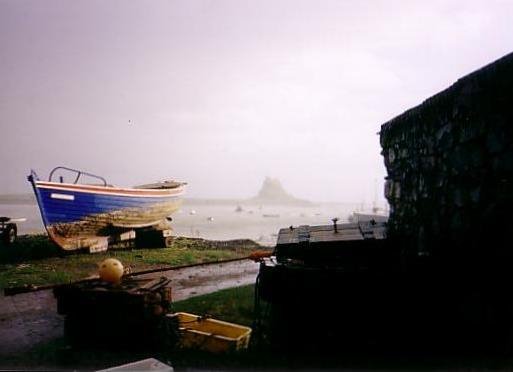 A boat-a shed-a castle (MISTY MORN AT LINDISFARNE HARBOUR) by trikermike