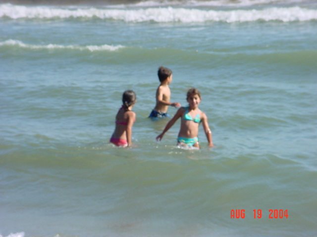 Kids in the water Cobourg Ontario by Gene Russo