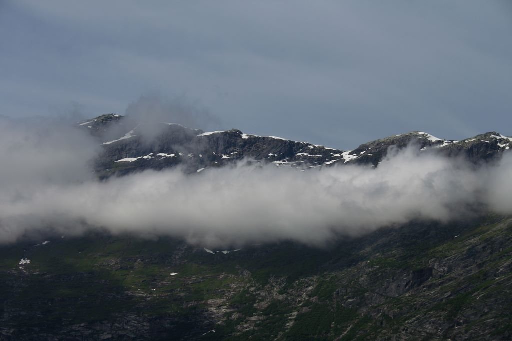 26.07.2006 Snow over clouds, Hardangerfjord, Norway by Desierk