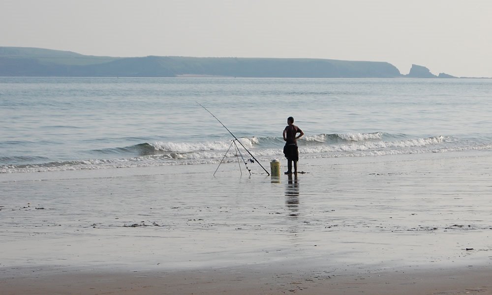 Fisherman, Tenby Beach by LindaEllis