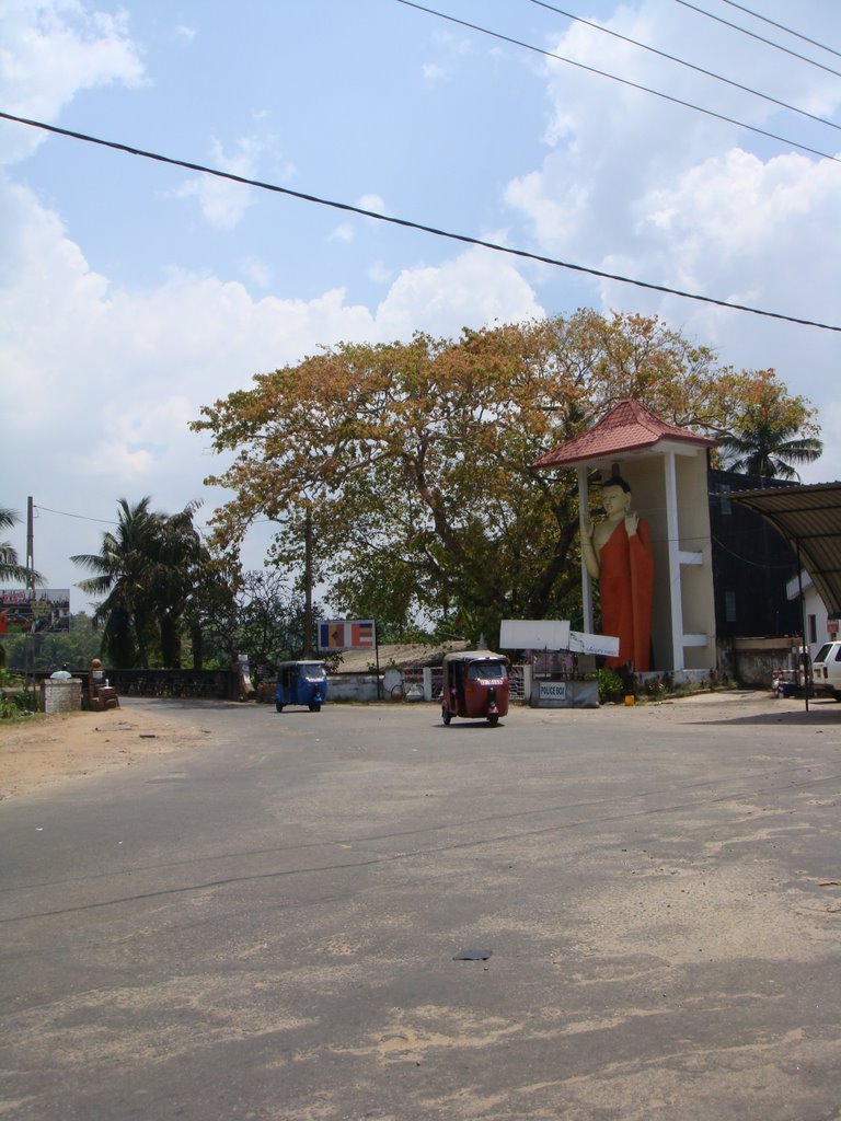 Buddha Statue near Moratuwa old Bridge by Buddika Hettitantri