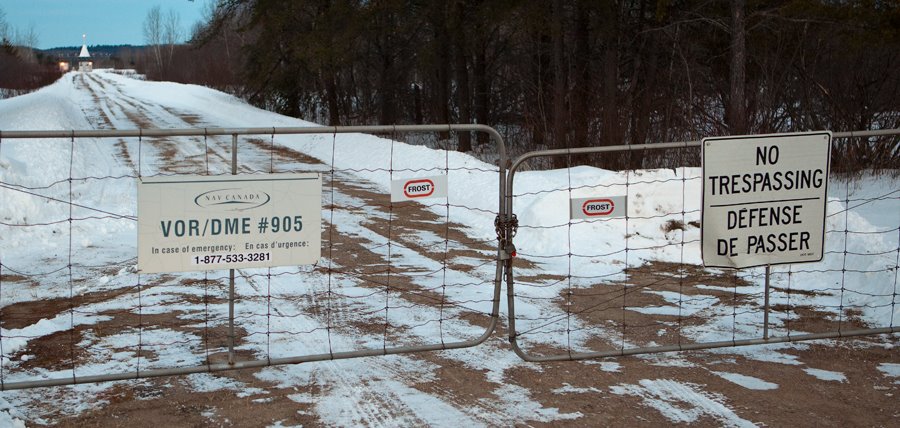 Gate Entrance With Warning For YXI by Mike Snider