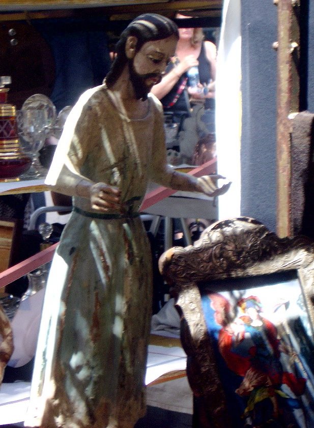 Wood Statue of Jesus in the Recoleta Market by peekers