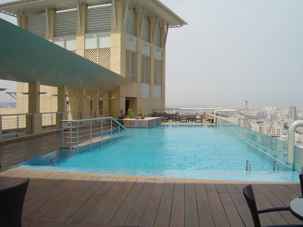 Rotana Hotel - Swimming Pool Deck by Hani K.