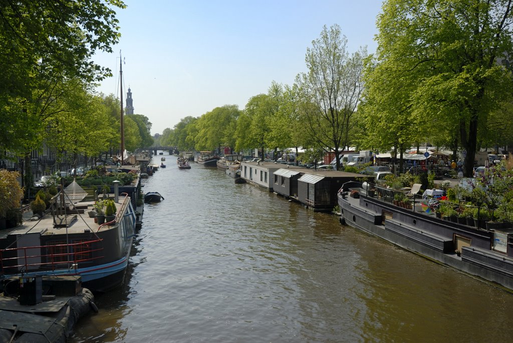 View down Prinsengracht from the Brouwersgracht Bridge, with the Westerkirk in the distance by Kevin Scott