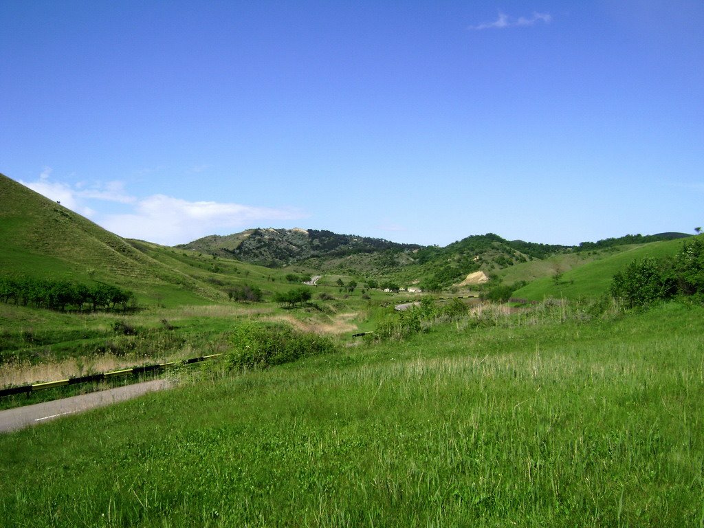 The road to Mudy volcanoes by Laurentiu Mitu