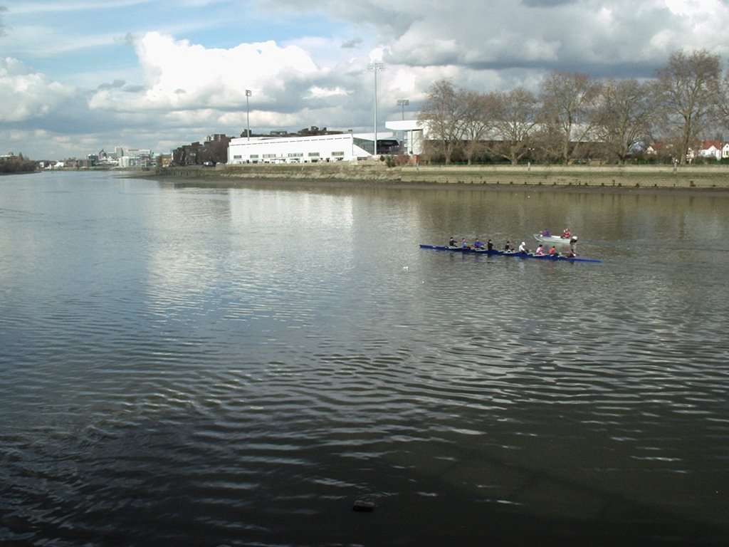 The Thames at Putney. Fulham FC behind by Gordon Abben