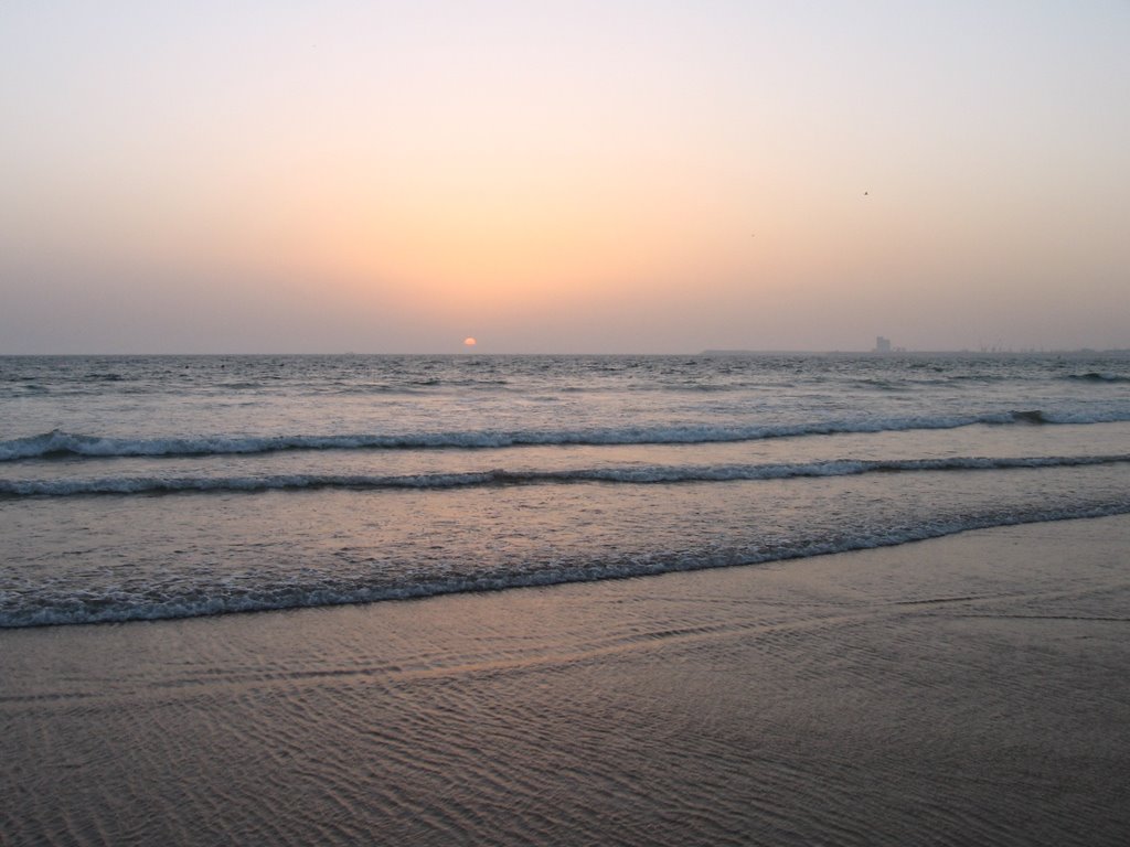 Sunset on the beach by Rafał Jaeschke