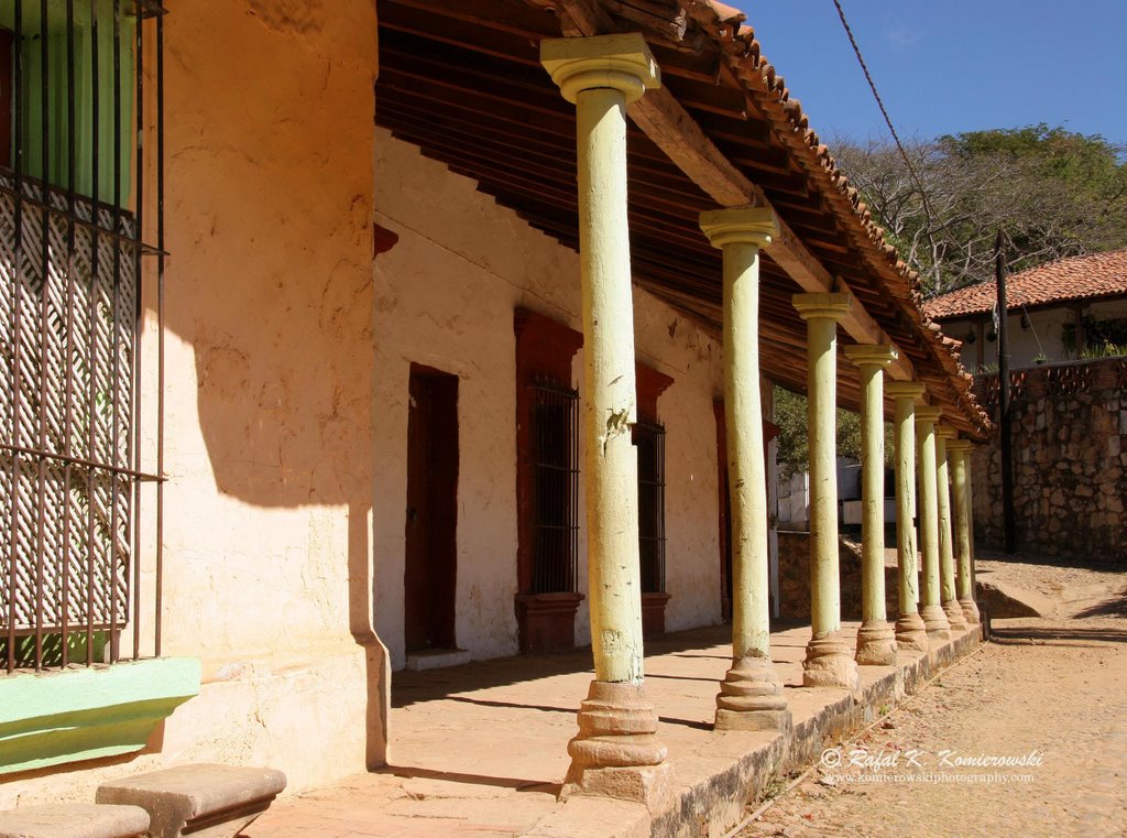 Colonial style home and coblestone street in Copala, Sinaloa, Mexico by Rafal K. Komierowski