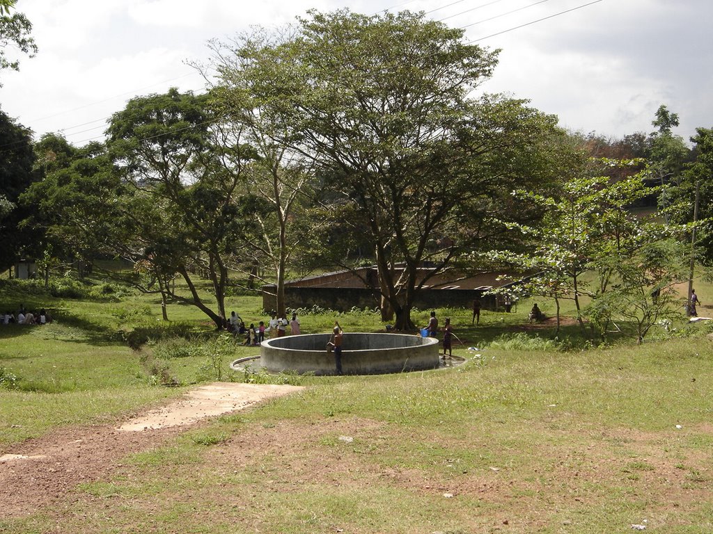 Bath tubs and a large well for pilgrims at Basilica by Ranjith Seneviratne