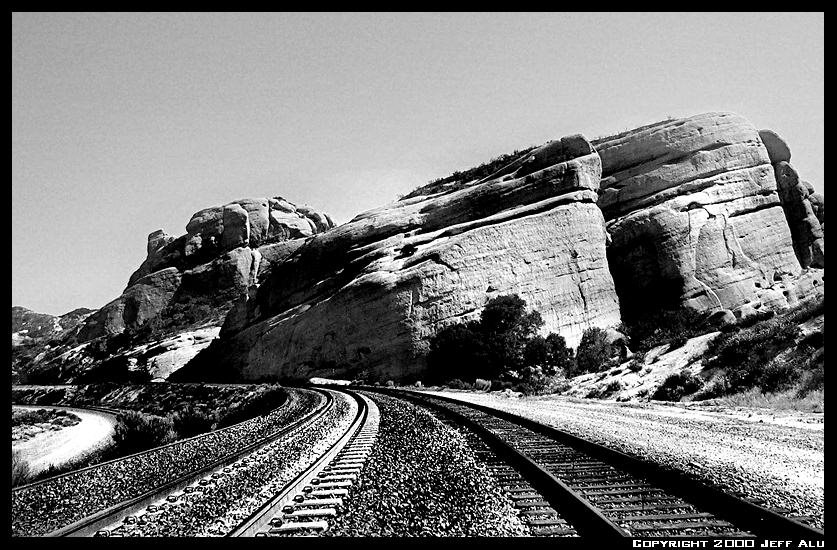 Two Tracks / Near Mormon Rocks by Jeff T. Alu