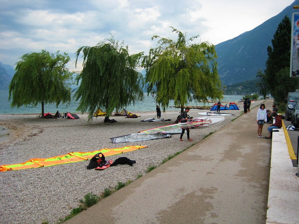 Paragliders and surfers at the beach, Lago de garda by Flemming151