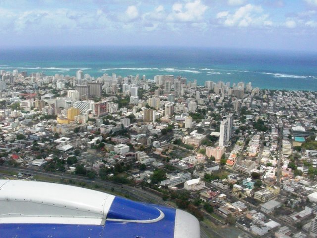 San Juan from landing airplane by Gaston08